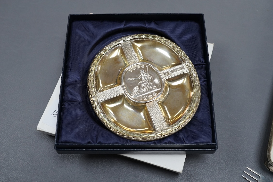 A collection silver to include a modern commemorative Britannia standard dish, cased, a cased set of six George VI teaspoons and other sundry flatware.